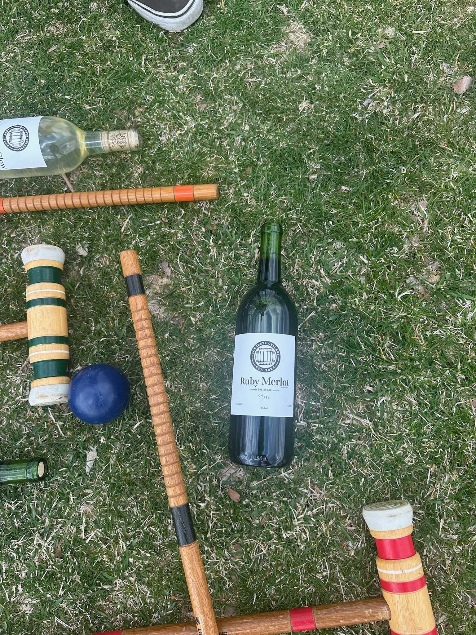 Ruby Merlot complementing a friendly game of croquet